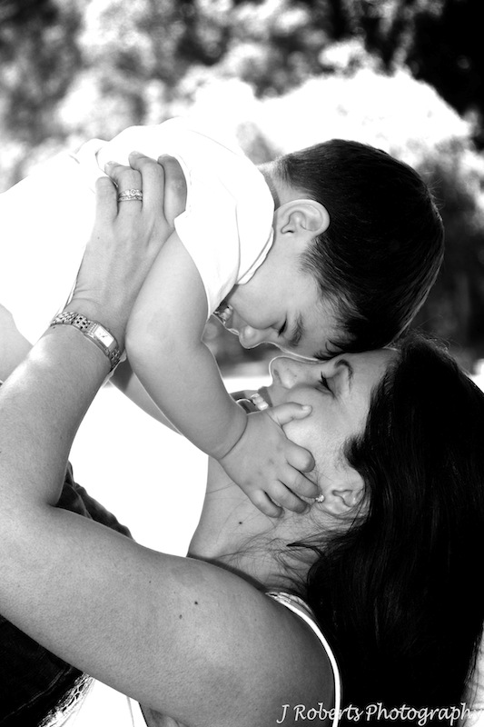 Mother and son intimate moment - family portrait photography